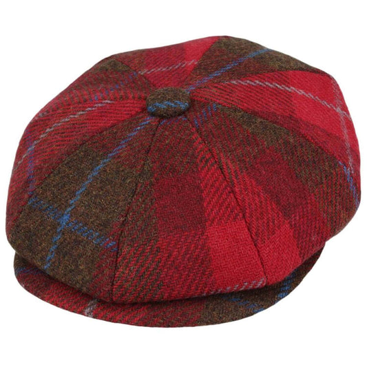 Red and brown plaid flat cap on a white background