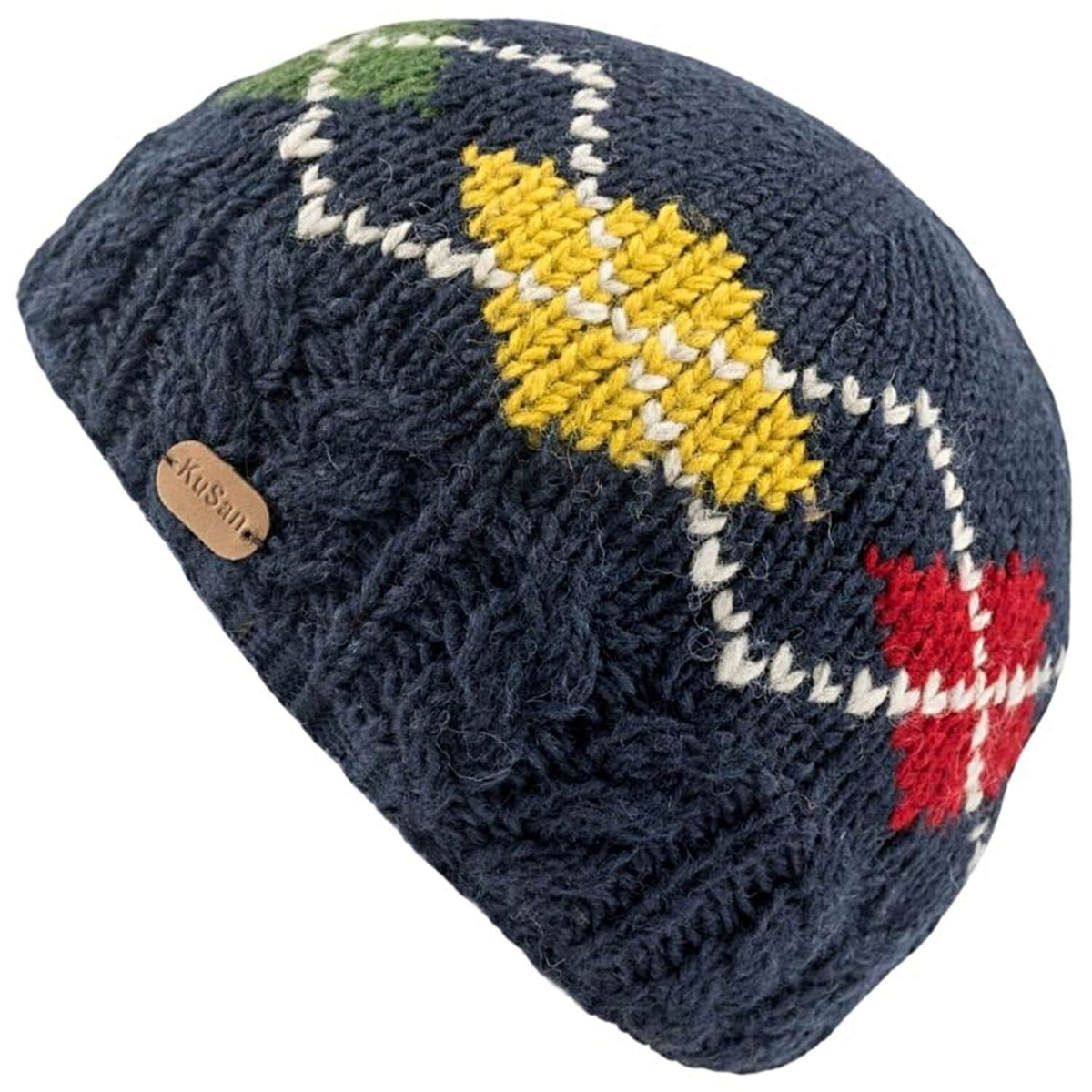 A navy blue cable-knit beanie hat featuring a colorful argyle pattern with yellow, red, and white diamonds, and a small tan leather brand patch on the side.