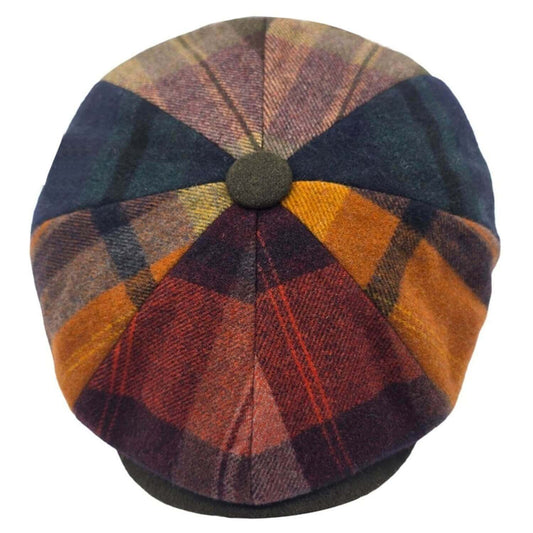 Multicolored checkered beret on a white background