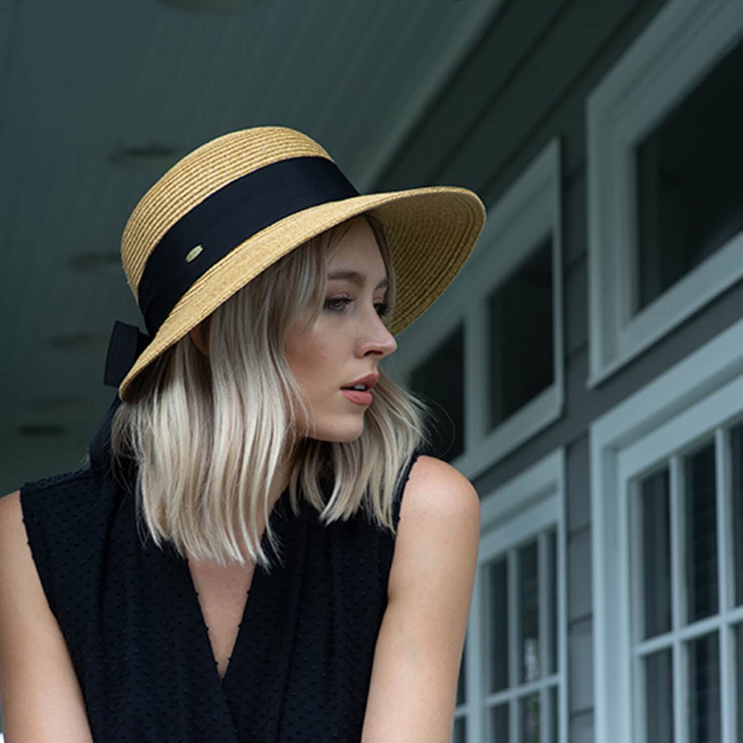 Womens Wide Brim Straw Sun Hat Being Worn