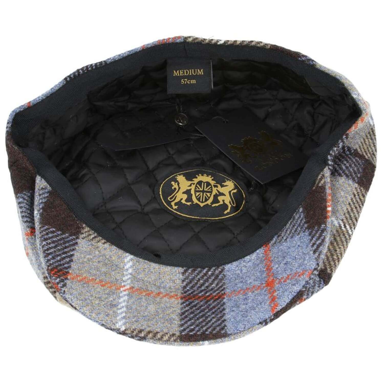 Plaid patterned cap with quilted black interior and brand emblem on a white background