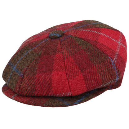 Red and brown plaid flat cap on a white background
